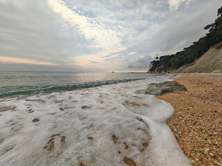 View of the beach of San Michele at early morning in the summer season, Riviera del Conero, Marche region, Italy