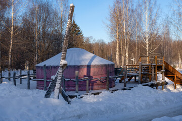 A yurt in a snowy winter forest. The place where cheesecakes and balls live in the Veretevo Art...