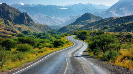 Fototapeta premium A vibrant image of a scenic road with winding paths and picturesque views, with a clean background and ample copy space for travel captions and messages.