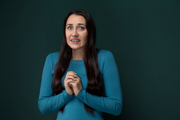 Fototapeta premium Woman Standing With Folded Hands