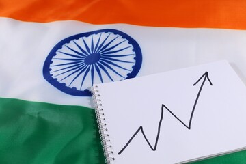 Growing economy concept with Indian flag and upward graph illustration