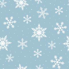 Seamless white and blue christmas repeat snowflake background.