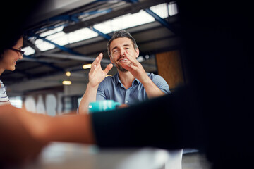 Collaboration, discussion and meeting with business people in creative workplace together for...