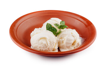 Three scoops of vanilla ice cream melting in rustic bowl with mint garnish
