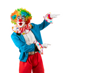 Surprised clown pointing at blank template copy spase for advertising, posters, greetings, invitations. Entertainer as Joker in a suit and wig, with clown whiteface makeup.
