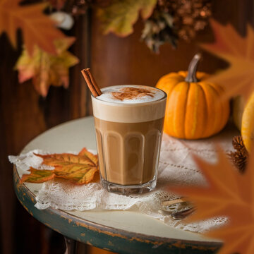 cup of coffee with cinnamon sticks