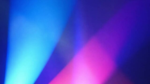The neon lights cast a vivid beam through the air, their illumination scattering like a spectrum of colors as the sunbeam refracted off the surfaces around them.