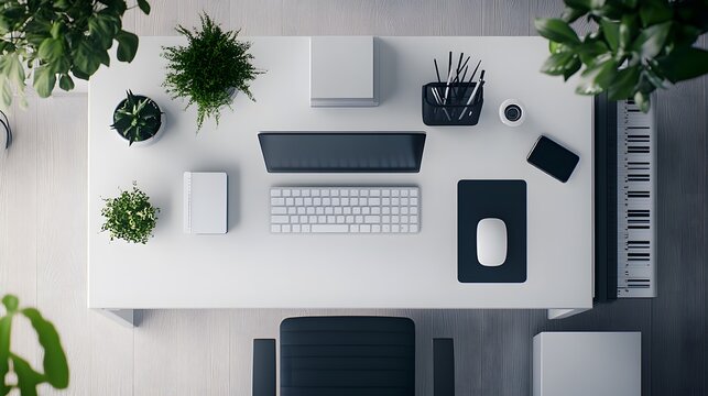 A top-down view of a simple, modern desk setup with clean lines and minimal clutter