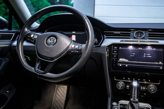 Gdansk, Poland - August 18, 2024: View of the interior of the Volkswagen Passat B8 car illuminated in the evening.
