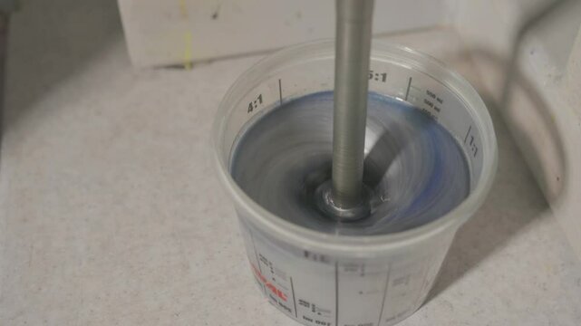 Industrial Mechanism Mixes Silver Metallic Paint 