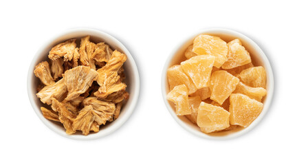 Bowl plates with sweet dried pineapple pieces isolated on white background.Top view.
