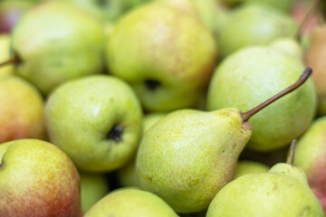 close up of fresh ripe pears as background