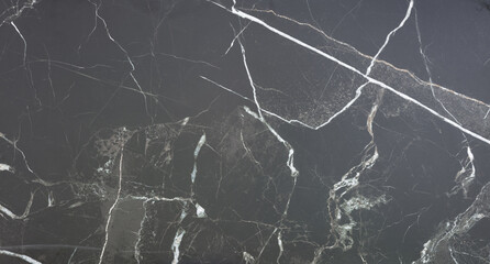 black marble background. black Portoro marbl wallpaper and counter tops