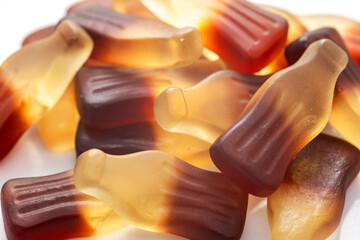 Close view of cola bottle gummi sweets candies