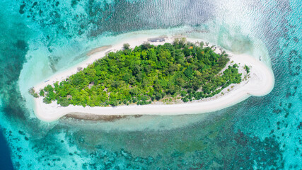 Aerial view of tropical island white sandy beach and clear azure water in summer. Tropical...