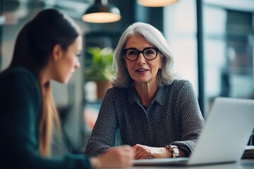 Portrait photograph of a senior woman as a consultant