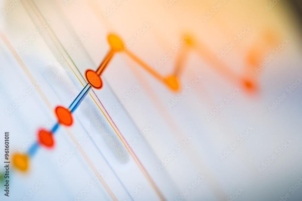 Poster close-up of a colorful line graph on a white surface