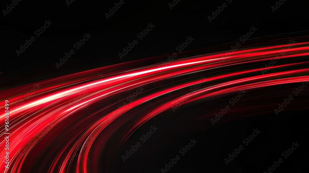 Poster vibrant red light trails curving rapidly on a black background, emphasizing speed and dynamic motion