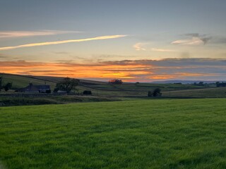 View of a sunset beyond the countryside