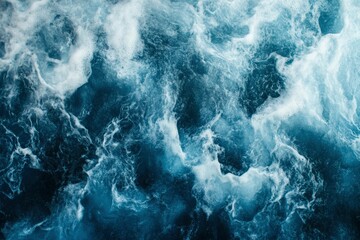 Obraz premium White Foam Swirling on a Dark Blue Water Surface