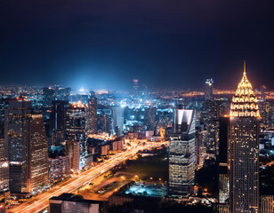 Obraz premium A modern cityscape with night lights at night