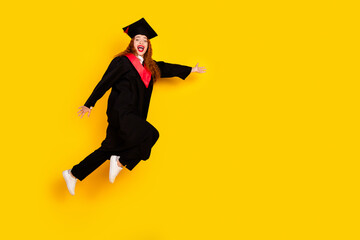 Photo of lovely cute girl college student wear black mantle run empty space isolated on yellow...
