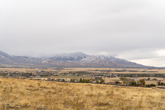 A cloudy and scenic view of the Stansbury Mountain range from Tooele, Utah.
