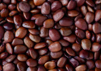 one seed used to serve as a measure of the weight of jewelry, as a background