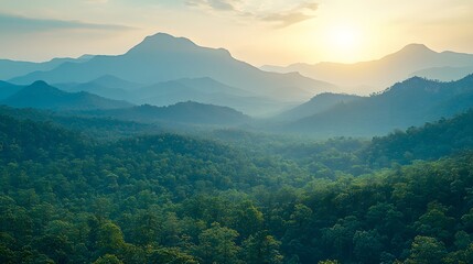 Obraz premium Breathtaking sunrise over lush green mountains and valleys.
