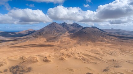 Naklejka premium Breathtaking view of mountainous desert landscape under a bright blue sky.