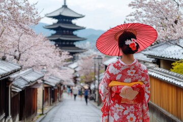 Japanese woman in traditional Kimono visit Yasaka Pagoda at Hokanji temple in Kyoto, Japan during full bloom cherry blossom in spring , ai