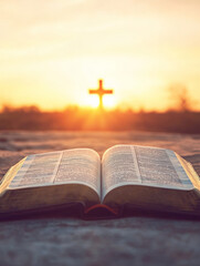 A peaceful sunrise over an open Bible, symbolizing the dawn of new understanding and spiritual enlightenment