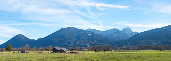 landscape panorama Bad Feilnbach, rural fields and alps view