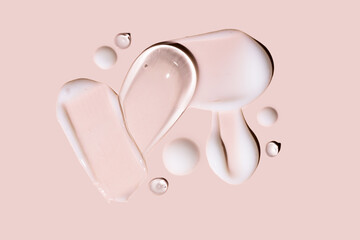 Soothe cream lotion moisturizer gel smears on beige background. Skincare and body beauty product. Liquid gel cosmetic smudges