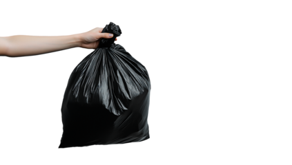 Hand holding black trash bag