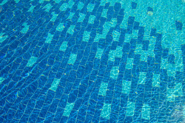 Swimming Pool Surface With Light Reflection and Water Ripple Patterns