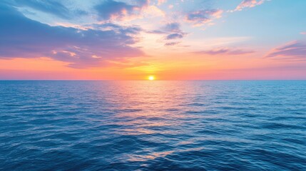 Fototapeta premium Sunset over a calm ocean, the sky painted with vibrant colors, symbolizing peace and beauty.