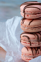 French pink macaroons on a light background 