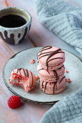 French pink macaroons on a light background 