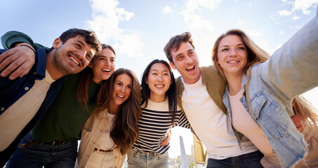 Selfie portrait of young beautiful people group looking smiling at mobile camera sharing happy...