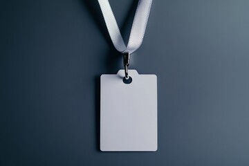 Blank name tag with lanyard on dark background for events and conferences