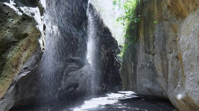 A serene waterfall in a stunning canyon, Hells Gate National Park, Kenya