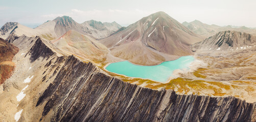 Aerial panoramic view Kelitsadi lake panorama. Keli volcanic plateau. Kazbegi national park....