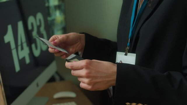 Unrecognizable woman concierge worker hotel reception give flight ticket check passport registration service tourist traveler passenger man arrive travel business trip tourism airport terminal control