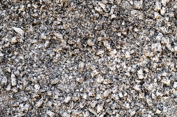 Ash close up as background. Cigarette ash texture top view