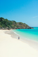 Traveler man relaxing on vacation beach joy nature view scenic landscape. summer background and summer holiday concept.