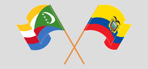 Crossed and waving flags of the Comoros and Republic of Ecuador. Vector illustration