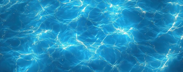 Clear blue water surface with gentle ripples and shimmering light reflections, ideal for nature or relaxation themes.