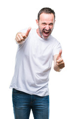 Middle age hoary senior man wearing white t-shirt over isolated background approving doing positive gesture with hand, thumbs up smiling and happy for success. Looking at the camera, winner gesture.