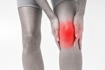 Close up of sporty woman with knee pain